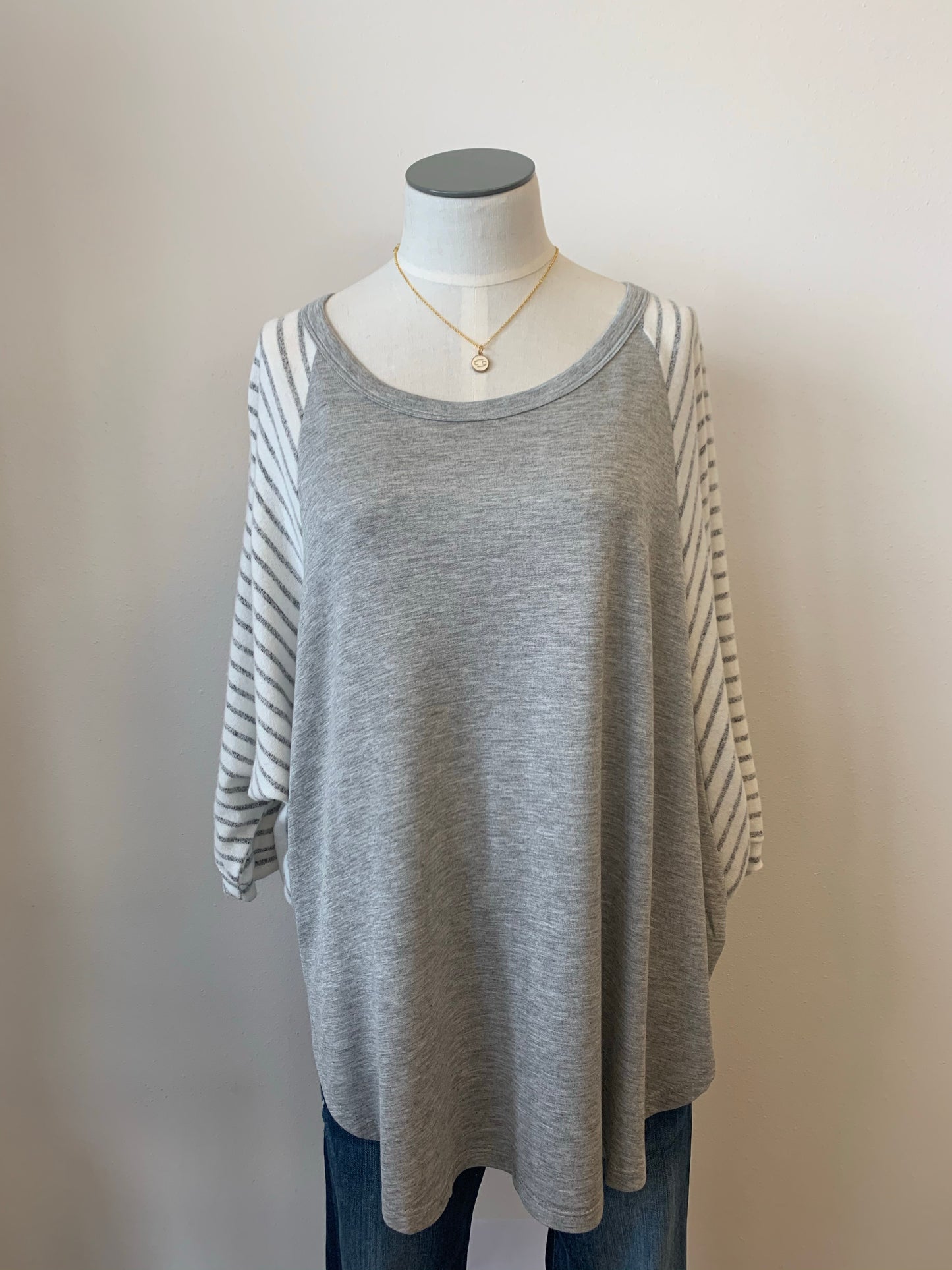 Draped loose fit solid & stripe top